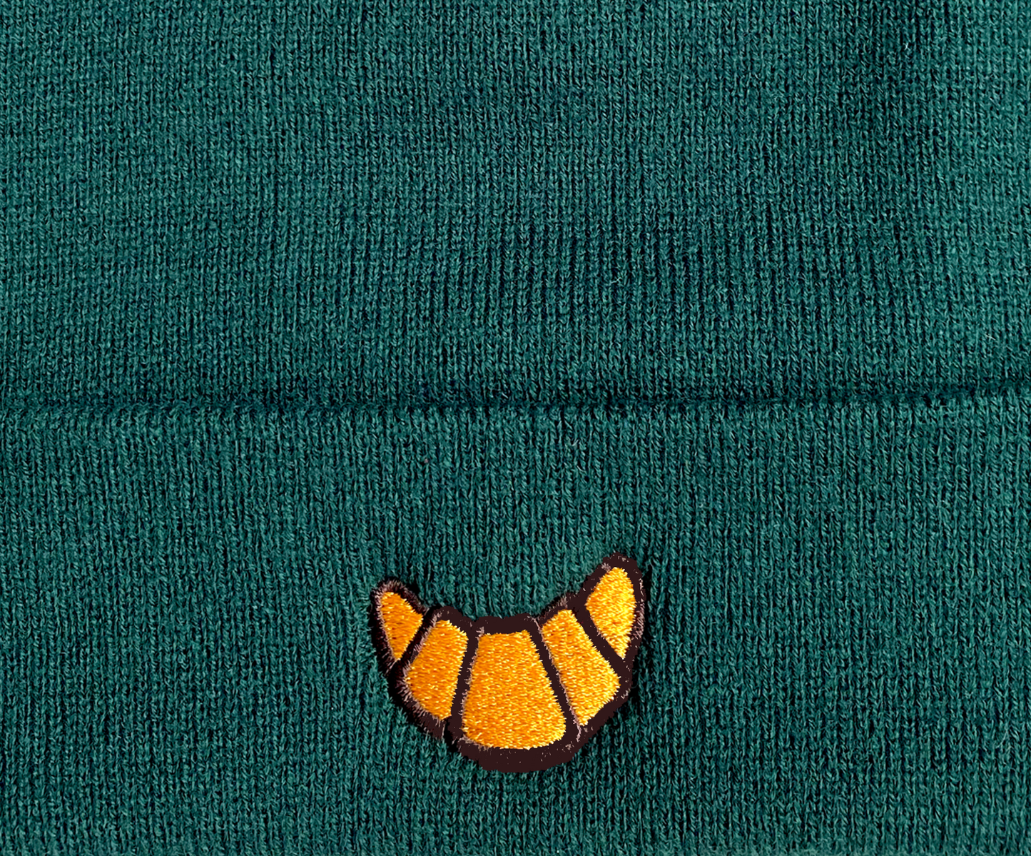 Muts croissant groen